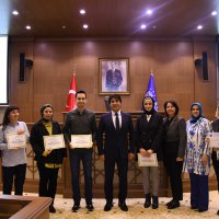 Personele katılım sertifikası töreni 