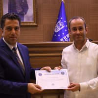 Personele katılım sertifikası töreni 